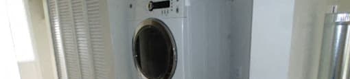 Willowbrook Estates in Brooks, AB ensuite laundry with dryer and washer