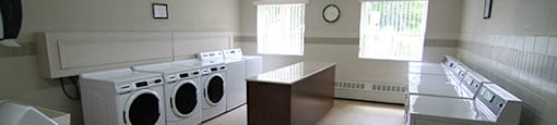 Cedarpoint Apartments in Cambridge, ON shared laundry room