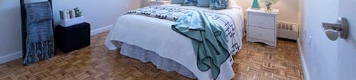 Cedarwoods Tower large bedroom with hardwood flooring in Kitchener, ON