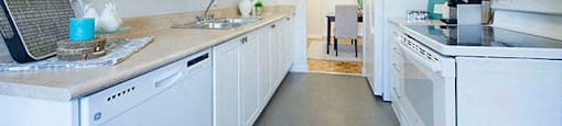 Cedarwoods Tower kicthen with dishwasher, full range stove, microwave, and full size fridge in Kitchener, ON