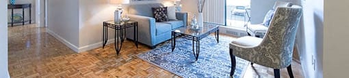 Cedarwoods bright, contemporary living room with access to balcony in Kitchener, ON