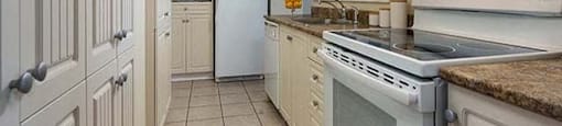Excelsior Apartments kitchen with full range stove in Montreal, QC