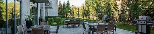 Excelsior Apartments outdoor terrace with BBQs in Montreal, QC