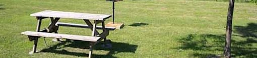 High Park Apartment property grounds with picnic table in Sarnia, ON
