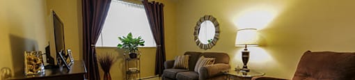 Garden Court in Windsor, ON living room with big window