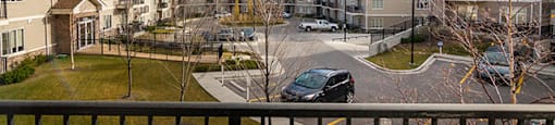 Beacon Heights in Calgary, AB view from balcony facing parking lot