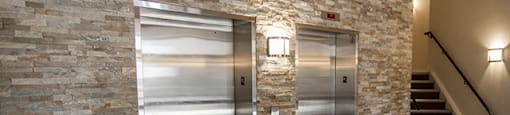 Rittenhouse in Kitchener, ON lobby with two elevators and stairs