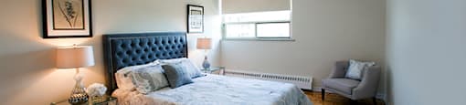 Rockford Apartments large bedroom with wood flooring in Toronto, ON