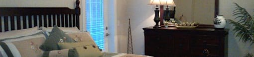 The Conservatory cozy bedroom in Kelowna, BC