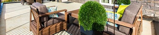 Giroux Estates in St. Albert, AB outdoor patio with lounge chairs and tables