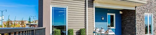 Giroux Estates in St. Albert, AB outdoor patio with dining table and chairs