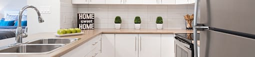 Summerhill Village apartment - modern kitchen with stainless steel appliances in Nanaimo, BC