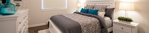Summerhill Village apartments bedroom featuring luxury vinyl flooring in Nanaimo, BC