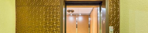 Shoreview in North Vancouver, BC Gold coloured elevator