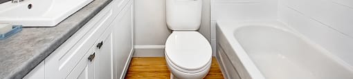 Park Towers Apartments renovated bathroom with extra large vanity and ample storage in 1 bedroom at 55 Carfrae in London, ON