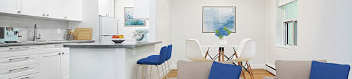 Park Towers Apartments image of open-concept kitchen, dining and living room of a renovated suite at 55 Carfrae in London, ON