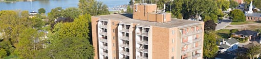 Exterior of building with lake views at Pickering Tower in Amherstburg, ON