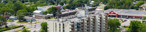 Prince William Apartments drone image of exterior of building in Bellville, ON