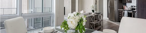 Open concept dining and living room at Axial Towers