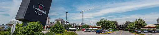 Driveway entrance to Marche 440, a shopping centre and market located next to Axial Towers in Laval