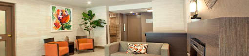 Regency Tower contemporary lobby with couch seating in Owen Sound, ON