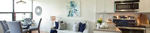 Regency Place open concept suites with view of living room and dining area from kitchen in Whitby, ON