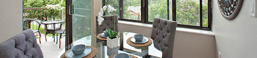 Bright dining area with access to balcony in Whitby, ON