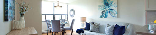 Regency Place cozy joined living room and dining area in Whitby, ON