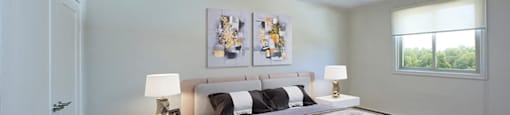 Regency Towers spacious bedroom with hardwood flooring in Owen Sound, ON
