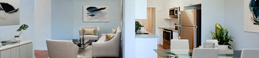 Regency Towers dining area with view into living room and kitchen in Owen Sound, ON