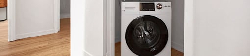 In-suite stacked laundry at Riverbend Tower Apartments in Chatham, ON