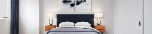 Second bedroom with a queen size bed and nightstands at Riverbend Tower Apartments in Chatham, ON