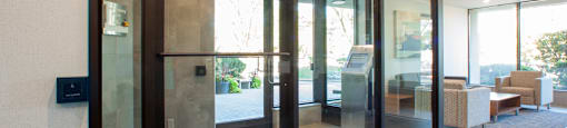 Royal Rose Apartments lobby area featuring digital intercom system in Etobicoke, ON