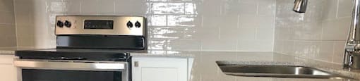San Remo/Monaco in Toronto, ON upgraded kitchen with modern cabinetry and countertop finishes