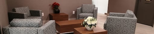 Silvercreek Towers in Georgetown, ON laundry facility lounge chairs and table