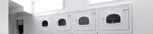 Somerset Place on-site laundry room in London, ON