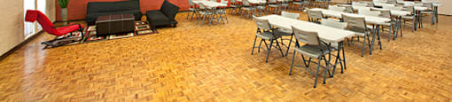 St. Lawrence Village in St. Catharines, ON Large social room for events with tables and chairs