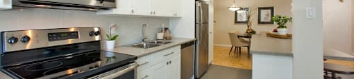 Sunnidale Place Sleek, stylish kitchen with open space and bright pot lights in Barrie, ON