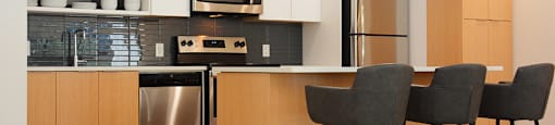 Surrey Village social room featuring catering kitchen in Surrey, BC