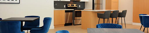 Surrey Village social room featuring banquet seating and catering kitchen in Surrey, BC
