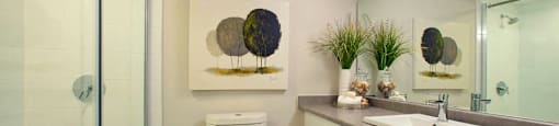 Tamarack Woods Modern full bathroom with glass shower doors and perfect lighting in Barrie, ON