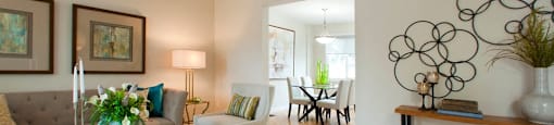 Tamarack Woods Living room connected to dining room, stylishly decorated with modern furniture and paintings in Barrie, ON