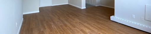 Living room at Tarawood Place in Peterborough, ON, looking towards entry and kitchen