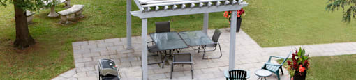 Testa Heights Apartments in Uxbridge, ON Outdoor Patio and BBQ area with view from above