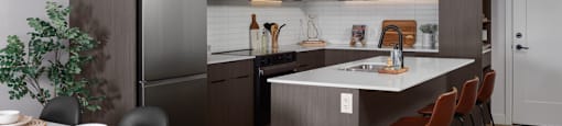 A modern kitchen with a dining table set for two at The Ambrosi in Kelowna, BC.