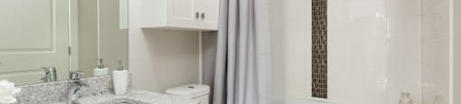 The Conservatory modern bathroom with full size bathtub in Kelowna, BC