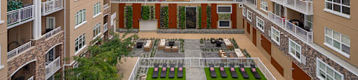 The Conservatory big courtyard with outdoor pool in Kelowna, BC