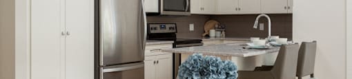The Conservatory view of modern kitchen from dining area in Kelowna, BC