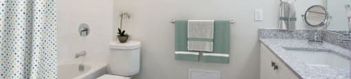 The Parkwood modern bathroom with full size bathtub in Bellville, ON