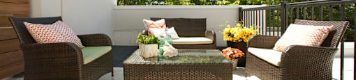 Towns on the Ravine Rooftop terrace with three wicker outdoor chairs